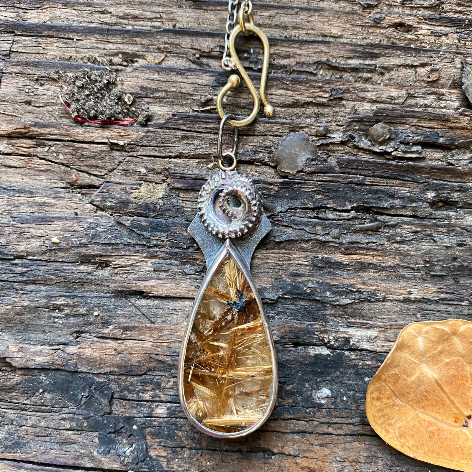 Rutilated Quartz Pendant with Octopus Tentacle